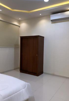 Unaizah Apartment | Child-Friendly Comfort at Apartment 102 for Your Stay