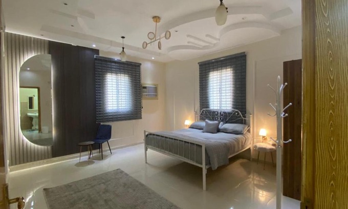 Muhayil Apartment | Comfortable Bedroom and Living Room for Your Family Stay