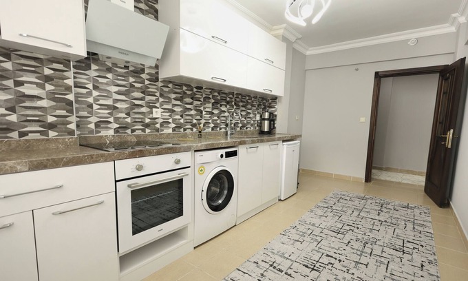 Trabzon Apartment | Relax in Rooms with Captivating City and Sea Views