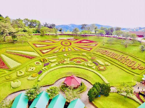 Mae Fa Luang Hotel | Discover DoiMok DokMai Resort: Poolside Bliss Awaits!