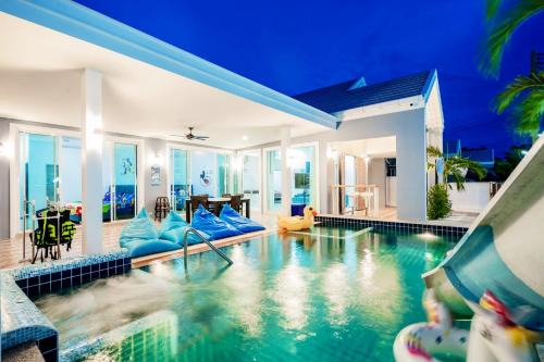 Cha-am Apartment | Relax at Ploy Poolvilla Cha-am: Oceanfront Getaway Awaits