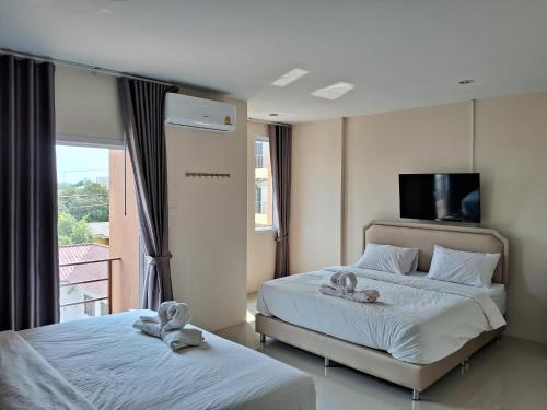 Huai Kapi Hotel | Discover K2 Guesthouse: Family-Friendly with Breakfast Included
