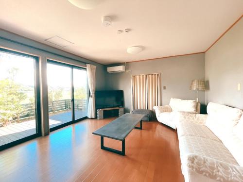 Kirishima House | Relax at OmoyaSai: Cozy Hot Tub & Family-Friendly Retreat
