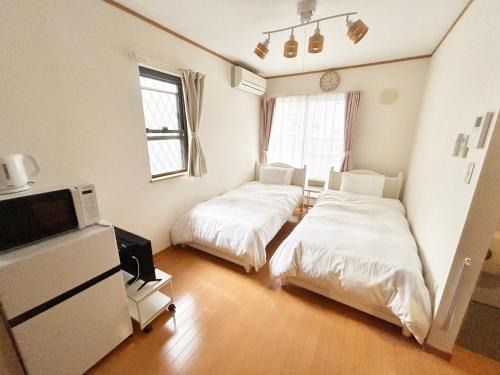 Jonan-ku House | Child-Friendly Comfort at さくら荘 102号室 - Rated 8.7/10
