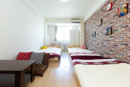 Shikitsuhigashi Apartment | Family-Friendly Guesthouse Near Daikokucho Station