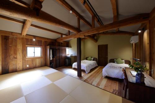 Toyooka Apartment | Inviting ゲストハウス長閑: Family-Friendly Retreat Awaits