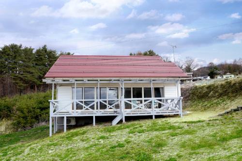 Komoro House | Experience Comfort at ヒュッテ・ボーデン with Hot Tub Access