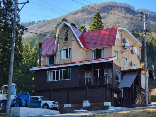 Yuzawa-machi Hotel | Cozy Lodge TONBO in Ishizuchi: Family-Friendly Amenities