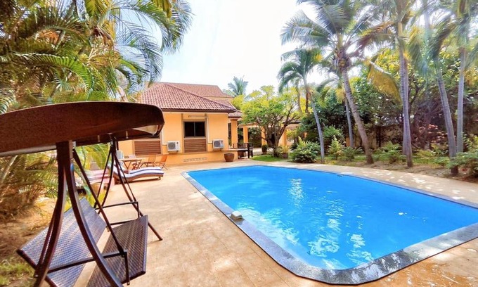 Wua Lai Villa | Elegant Villa with Pool Steps from Night Market & Ta Phae Gate