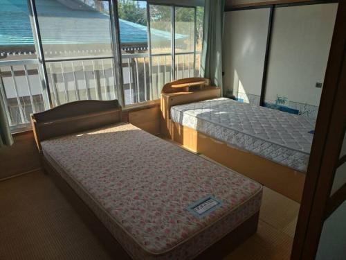Iwaki Apartment | Family-Friendly 名高儀の宿 with Kitchen Amenities