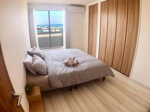 Ojima Island Villa | Oceanfront Retreat: 2-Minute Walk to Beach at 奥武壹号A棟