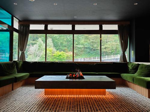Kamikawa Hotel | Discover Sounkyo Onsen Kumoi: Hot Tub & Breakfast Included