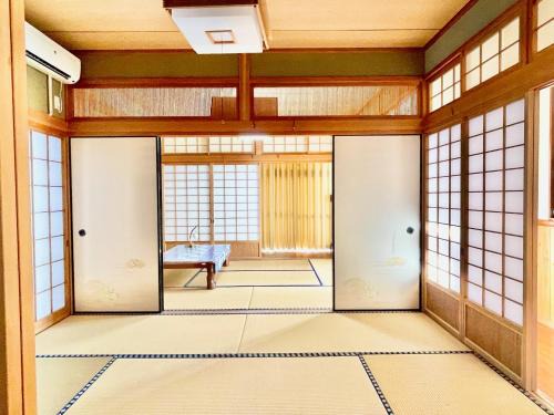 Tatsugo Apartment | Discover TINGO: Cozy Japanese Kominka Stay with Hot Tub