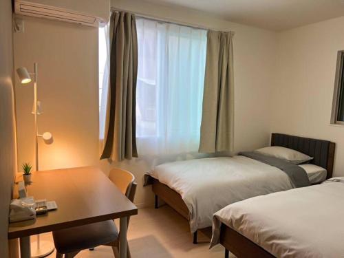 Tsuruhashi House | Relax at 嵐鶴橋: Family-Friendly with Hot Tub Bliss