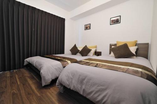 Marunouchi Apartment | Relax in Our Cozy Suite with Wheelchair Access & Child Care