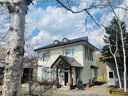 Shiraoi House | Experience Joyful Stays at Hot Springs Log House Retreat