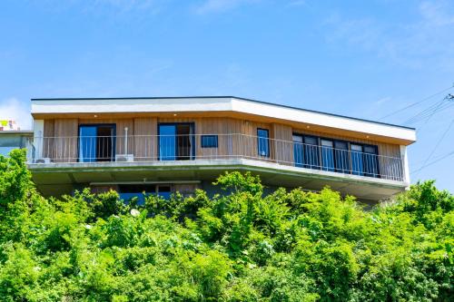 Shikiya House | Cozy Retreat at 海と星の南城邸 - Family-Friendly Stay