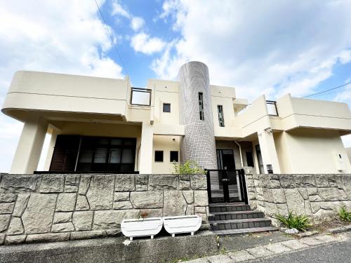 Yamato House | Explore Cocos Harbor: Oceanfront Bliss for Families