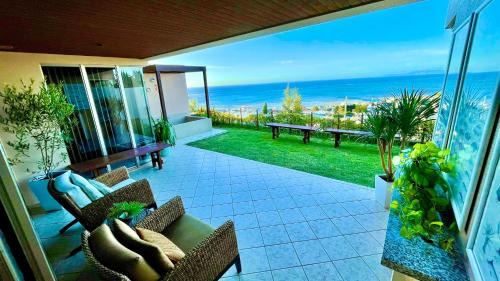 Kadena-cho Villa | Explore Comfort at 読谷目黒や: Pet-Friendly & Pool Access