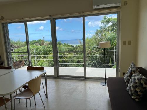 Ishigaki Cabin | Oceanfront Cottage 'Blue in Green' with Starry Nights