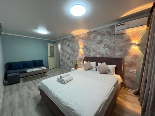 Kyzylorda Apartment | Cozy City-Center Apartments with Pool and Restaurant