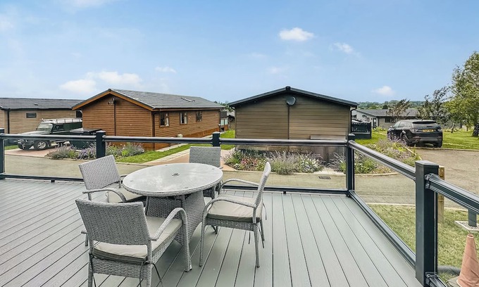 Bredons Hardwick Ski Chalet | Discover White Ash: Central Lounge and Inviting Amenities