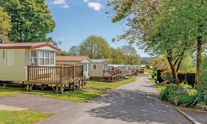 Narberth House | Cozy Caravan Retreat with Pool, Hot Tub & Family Amenities