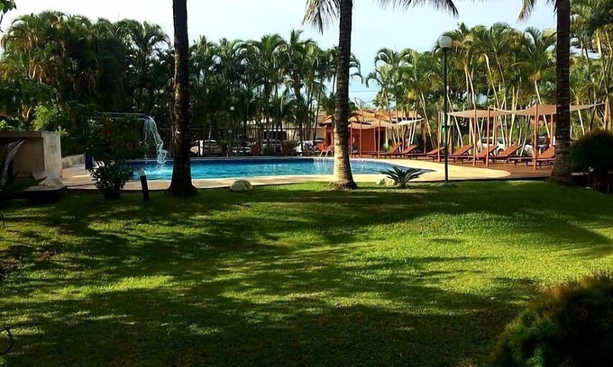 Maresias Apartment | Oceanfront 1 Bedroom Apartment with Pool Access Near Beach