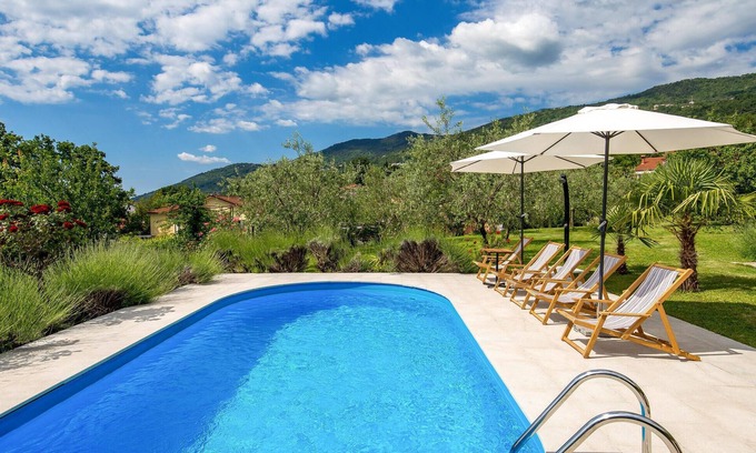 Ika House | Discover Ika: Oceanfront Getaway with Pool and Spa