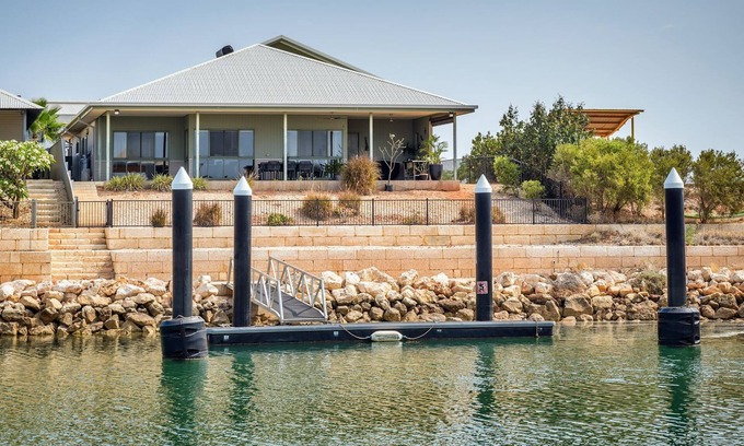 Exmouth House | Pet-Friendly Marina Retreat with Private Jetty & Ocean Views