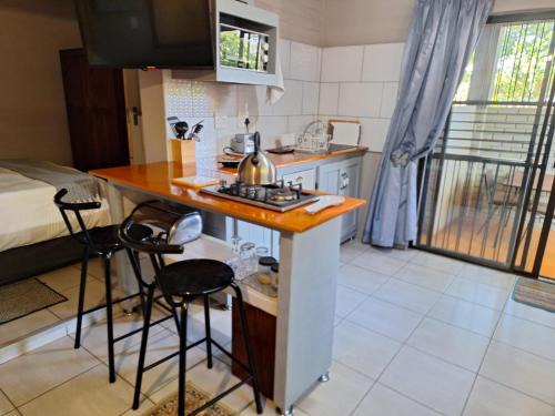 Mokopane Bed & Breakfast | Family-Friendly Retreat at 1@Kruger with Hot Tub Access