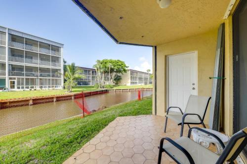 Island Estates Apartment | 1 Mi to Lantana Beach Canal-View Condo with Pool
