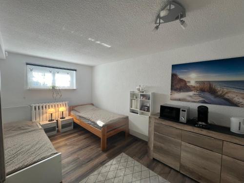 Eichsfelder Kessel Apartment | Child-Friendly 1-Raum Ferienwohnung in Niederorschel