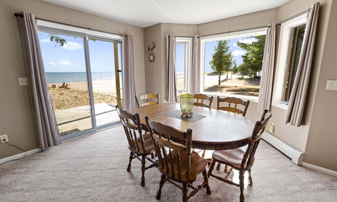 Oscoda House | Beachfront Retreat with Balcony Views at Thomas' Parkside
