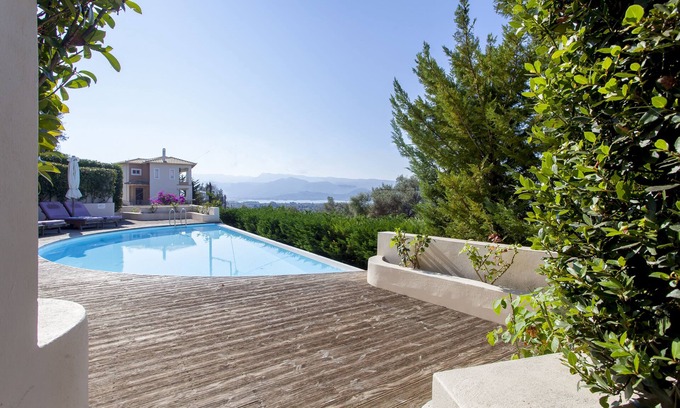 Spanokhorion Apartment | Modern Sophia Maisonette: Poolside Oasis with Ocean Views