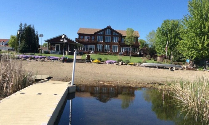 Elysian House | Experience Beachfront Bliss with Dock & Games for Families