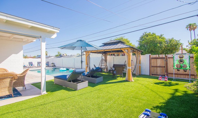 Cox Heights House | Enjoy a Relaxing Stay: Heated Pool, Hot Tub & Game Room