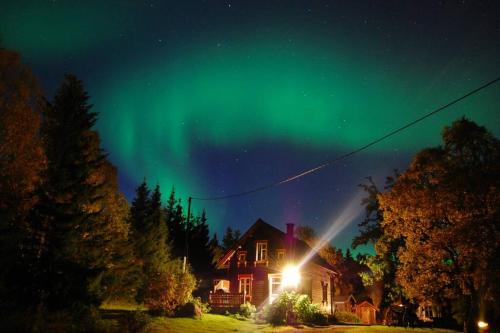 Kvaloya House | Experience a Historic Norwegian Log House in Tromsø