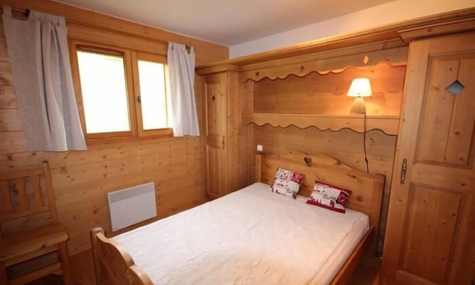 Bisanne 1500 Apartment | Cozy Retreat in Les Saisies: Balcony, Parking & Spa Access