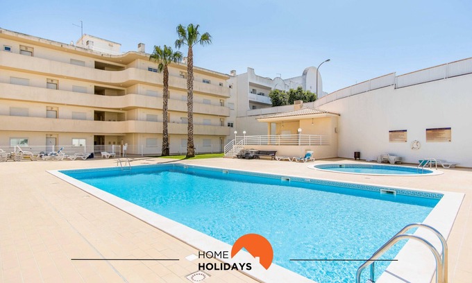 Montechoro Apartment | Relaxing Newtown Escape with Pool and Spa Amenities