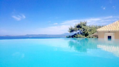 Pylos Apartment | Experience 12 Gods Resort: Oceanfront Haven Awaits