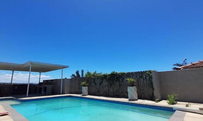 Bluff House | Family-Friendly Retreat at 125 on G with Pool Access