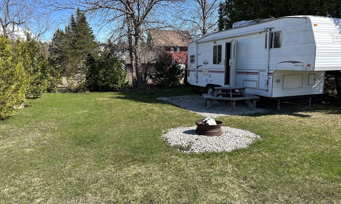 Stokes Bay House | Inviting Camping Retreat with Scenic Waterviews