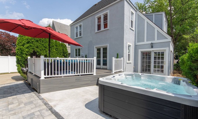 Baldwin House | Unwind Near UBS Arena: Hot Tub, Game Room & King Bed