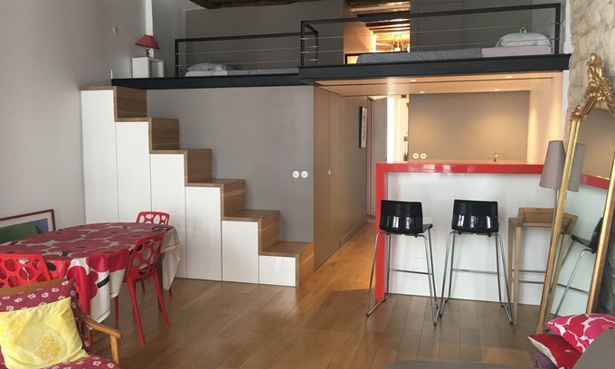 Arsenal Apartment | Historic 17th Century Mansion in Marais Near Seine River
