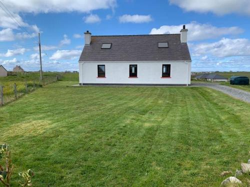 Isle of Lewis House | Top-Rated Hotel at 18 Cross Skigesrta Road with Hot Tub