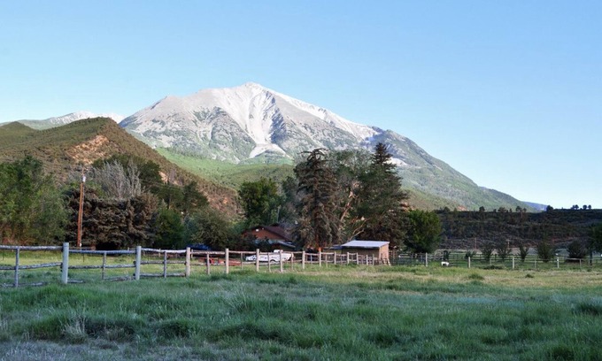 Carbondale Cabin | Inviting 1907 Creekside Cabin with Hot Tub and Sauna