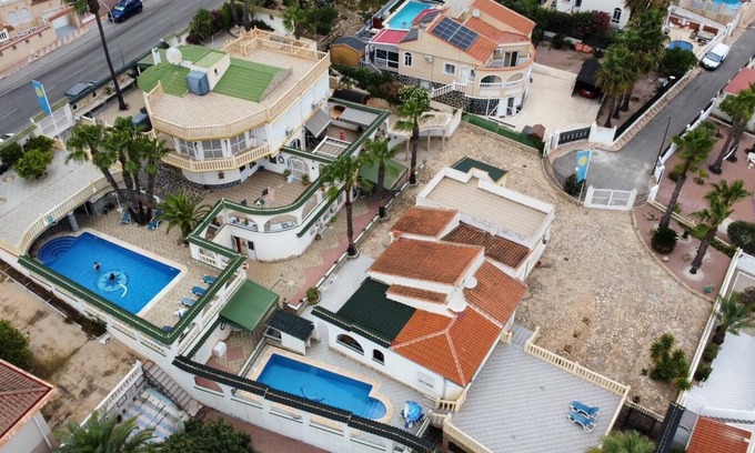 San Fulgencio Apartment | Experience 1a Mc Games Holiday Complex with Oceanfront Views