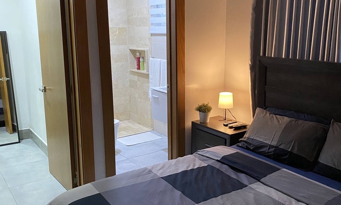Ensanche Quisqueya Condo | Prime Location: Pool, Sauna & Gym - 10/10 Guest Rated!