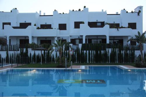 Mar de Pulpi Apartment | Beachfront Bliss in Mar de Pulpi with Family-Friendly Pool